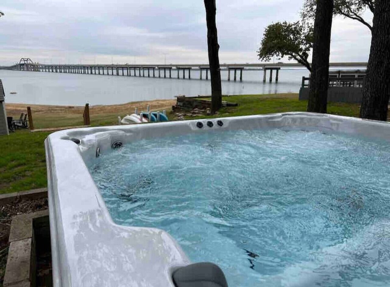Modern beachfront lake house with hot tub on Lewisville Lake near Dallas