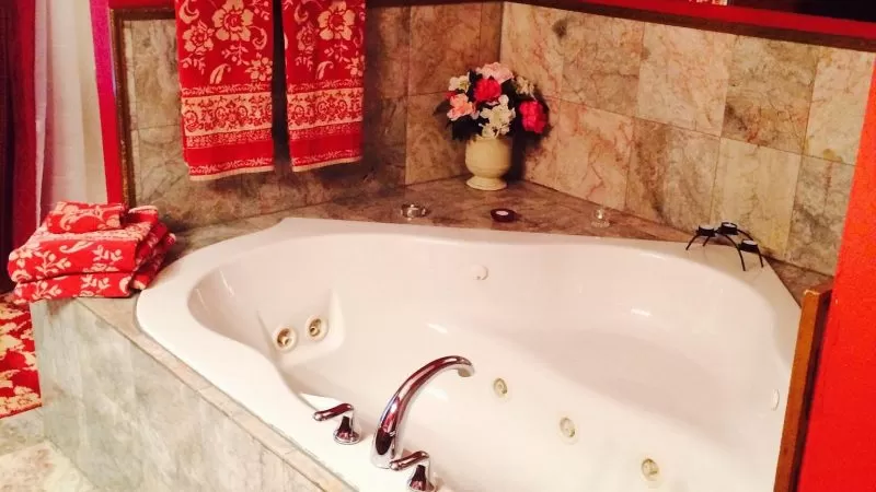 The Whispering Pines Inn Bed and Breakfast Norman Oklahoma jacuzzi suite most romantic